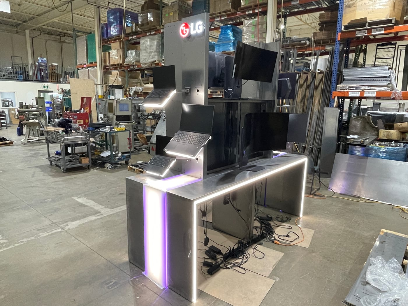 The LG UltraGear display table built and lit during fabrication at the Access Retail Group facility