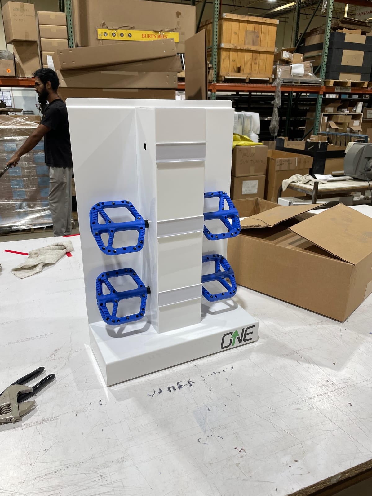 OneUp Components pedal display unit holding mounted pedals